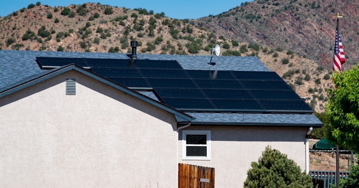 Home with Solar panels on roof - Residential Solar Panels